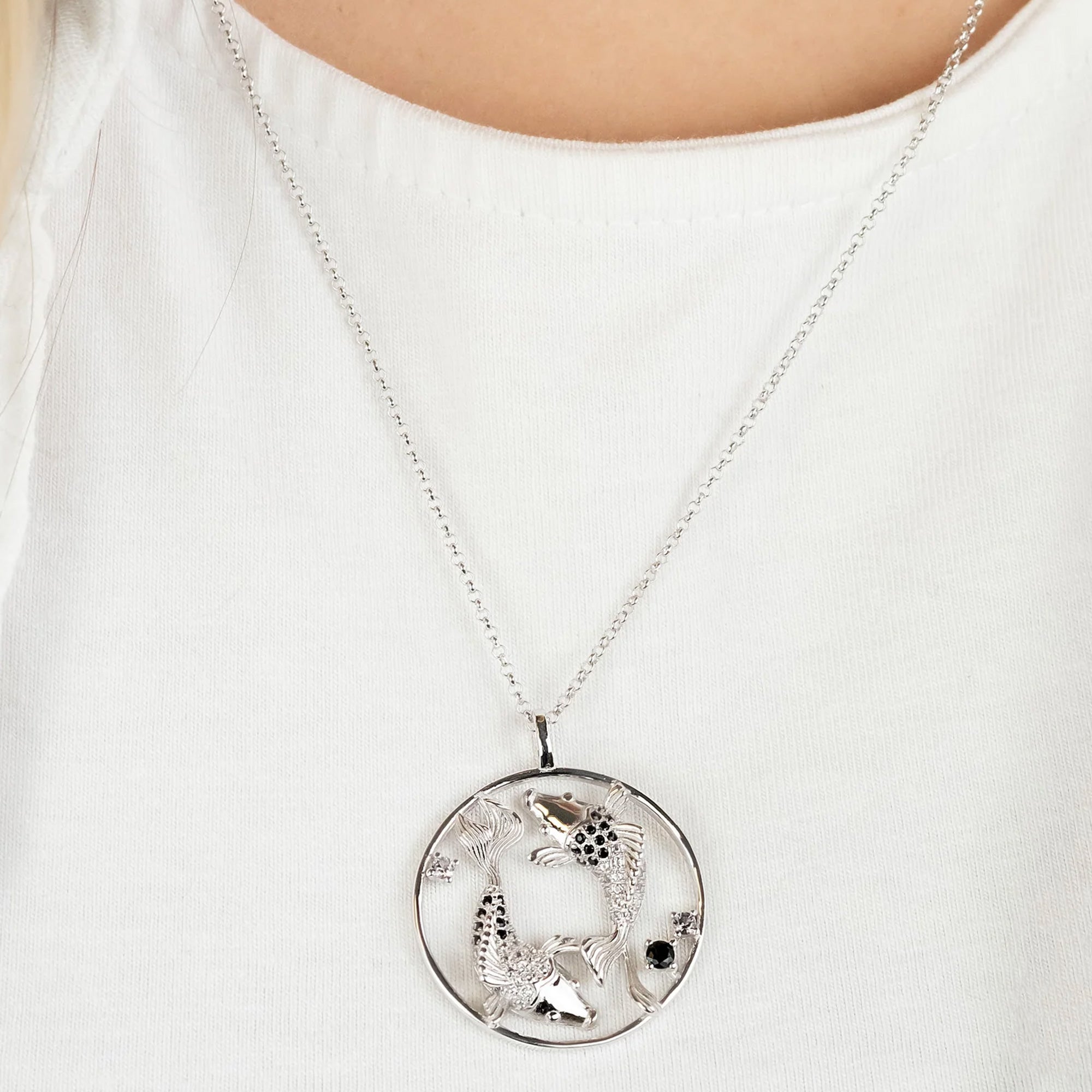 Woman Wearing Sterling Silver Koi Fish Dark Shade Yin Yang Balance Necklace