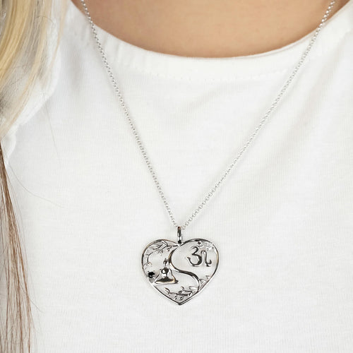 Woman Wearing Sterling Silver Yin Yang Buddha Om Heart CZ Leaf Necklace