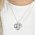 Woman Wearing Sterling Silver Yin Yang Buddha Om Heart CZ Leaf Necklace