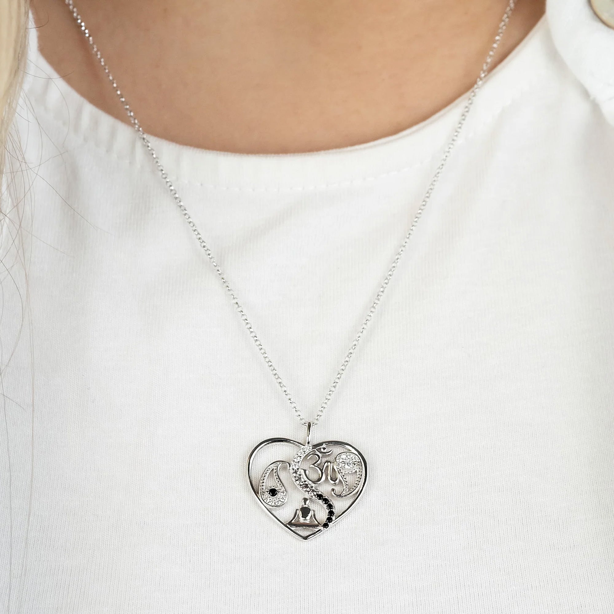Woman Wearing Silver Yin Yang Balance Buddha Om Heart CZ Necklace