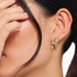 Woman Wearing Thomas Sabo Butterfly Paradise Gold Stud Earrings