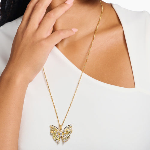 Woman Wearing Thomas Sabo Butterfly Paradise Gold Pendant