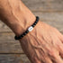 Man wearing Anchor & Crew coffee bean silver black agate stone bracelet