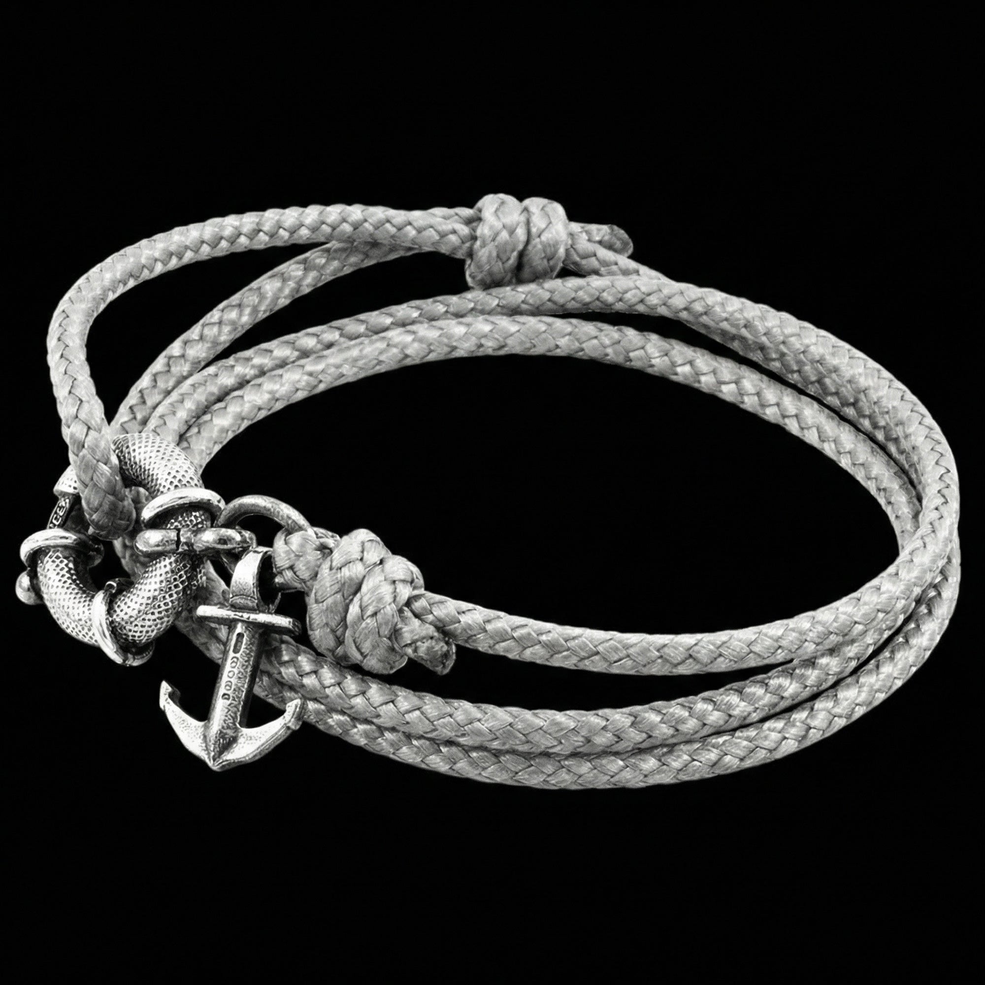 Side view of Anchor & Crew Clyde sterling silver grey rope bracelet.