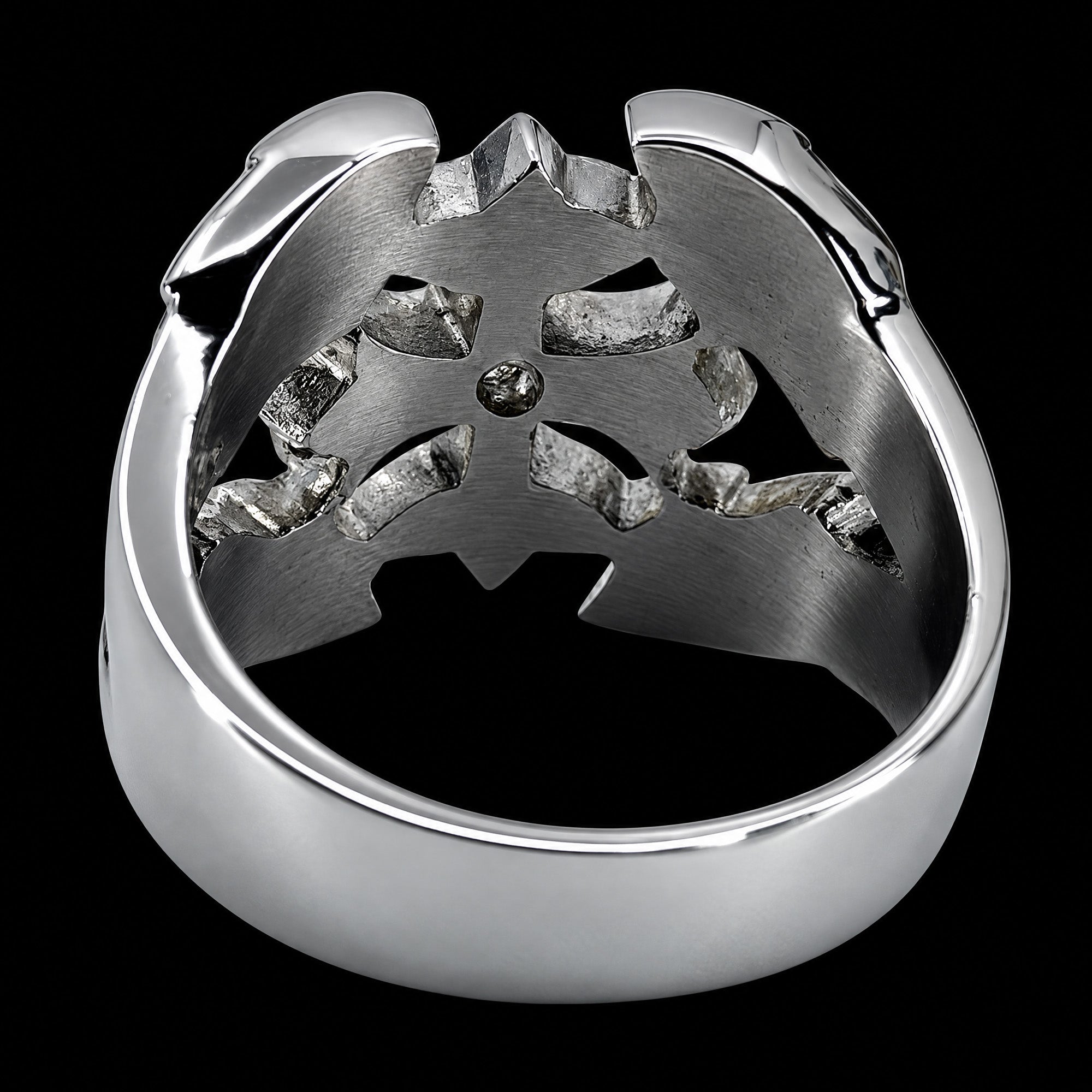 Back view of a winged barbed cross stainless steel men's ring.