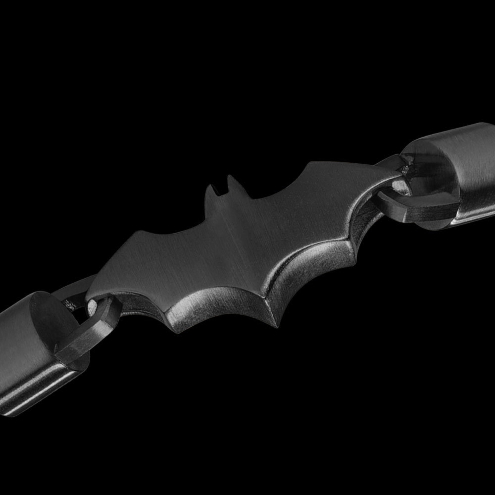 Close-up of Police Batman batarang black limited edition bracelet.