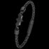 Tilted side view of Police Batman batarang black limited edition bracelet with clasp open.