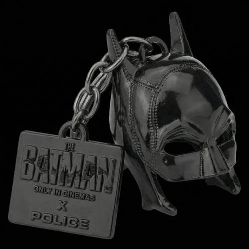 Close-up of Batman cowl mask black steel keyring.