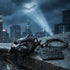Batman cowl mask black steel keyring on a rain-covered building ledge overlooking the city with the bat signal illuminating the night sky in the background.
