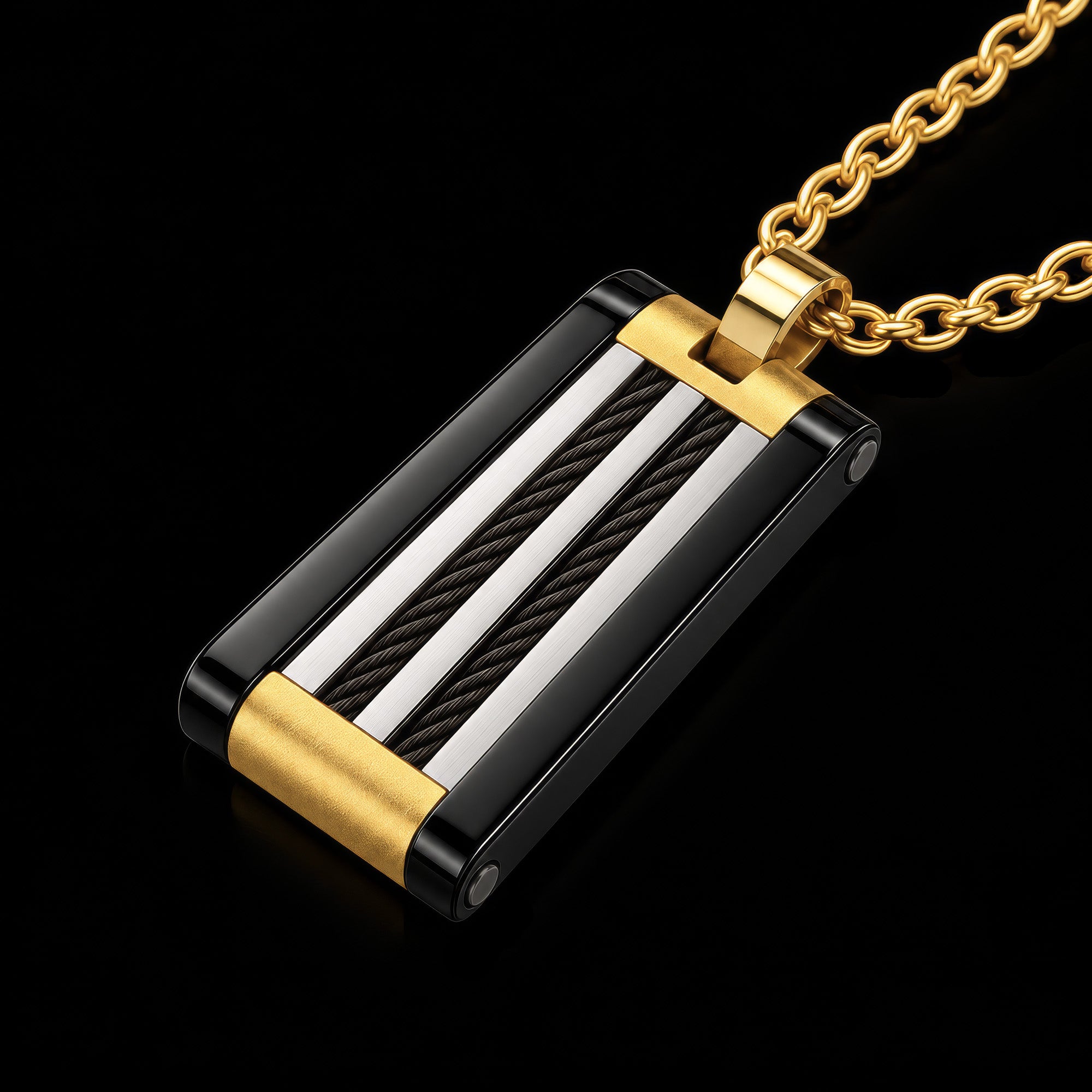 Angled view of a black and gold steel cable dog tag men's necklace.