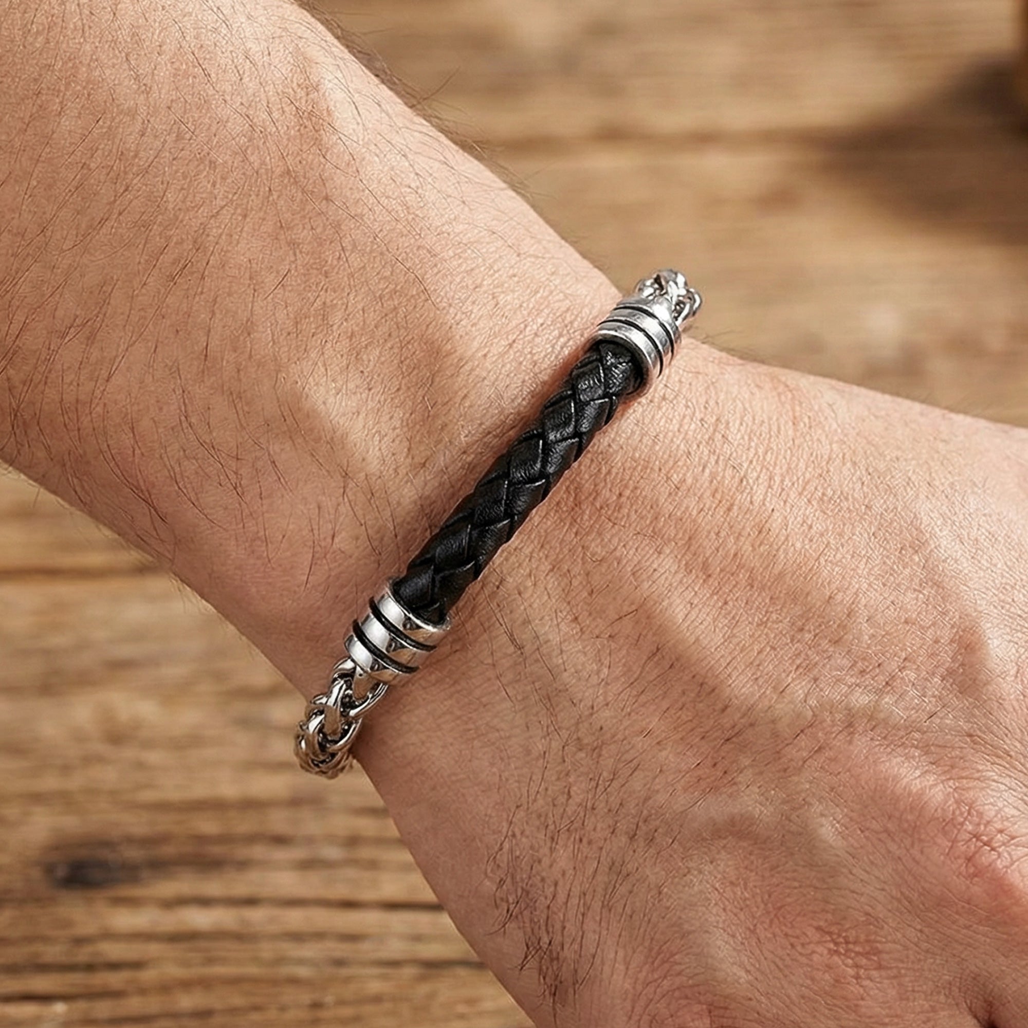 Man wearing Maximan Midnight men's black leather steel chain bracelet