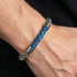 Man wearing  Maximan Daybreak men's blue leather steel chain bracelet