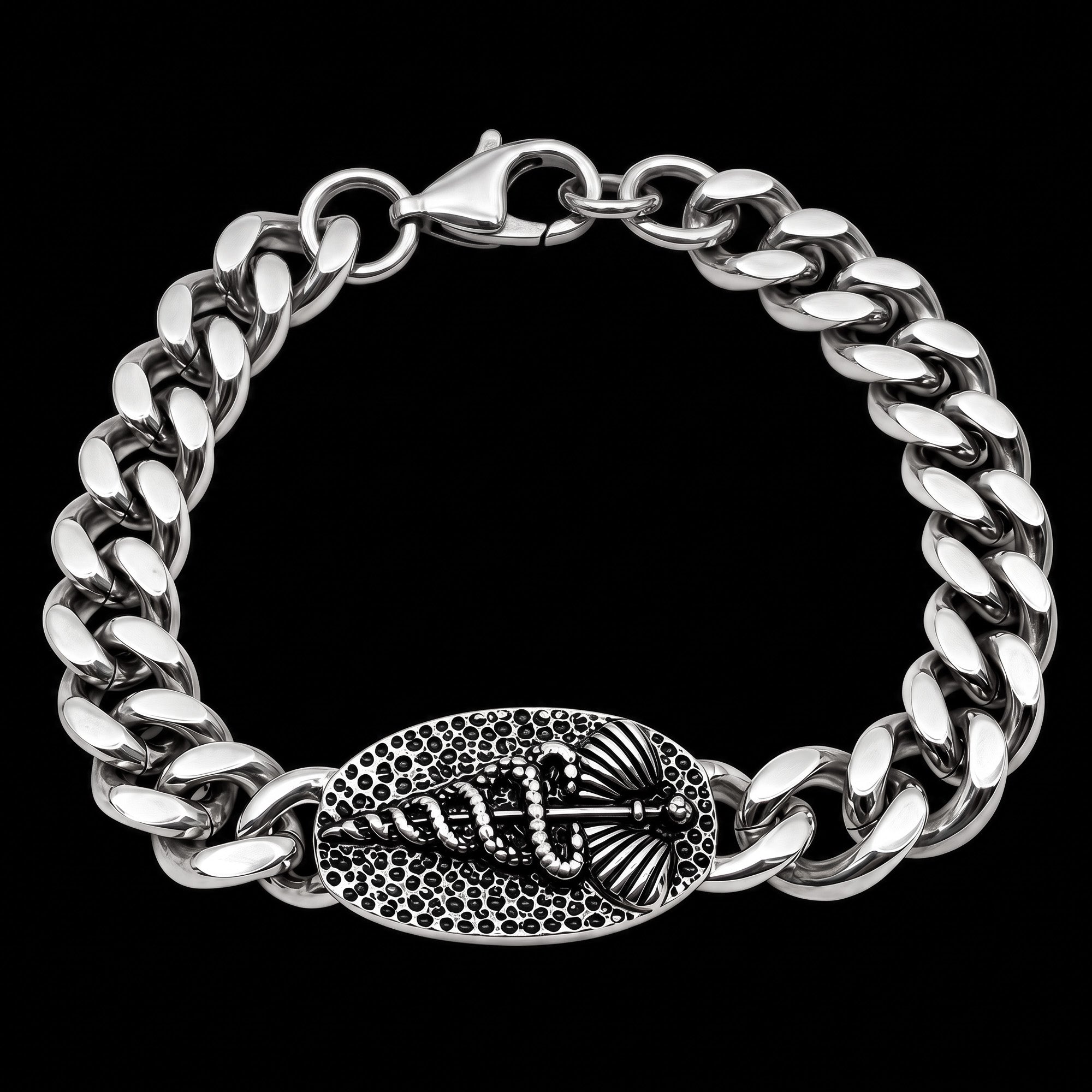 A caduceus Cuban link men's stainless steel bracelet showing secure clasp closure.