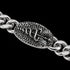 Close-up of a caduceus Cuban link men's stainless steel bracelet.