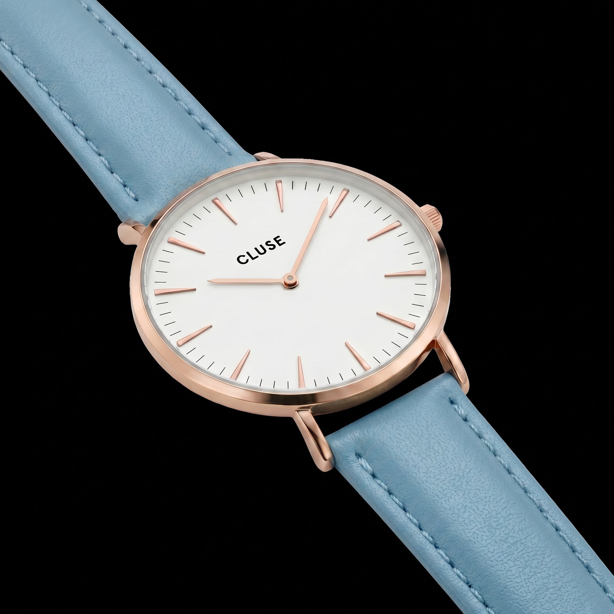 Close-up of Cluse La Boheme rose gold white/pastel baby blue watch.