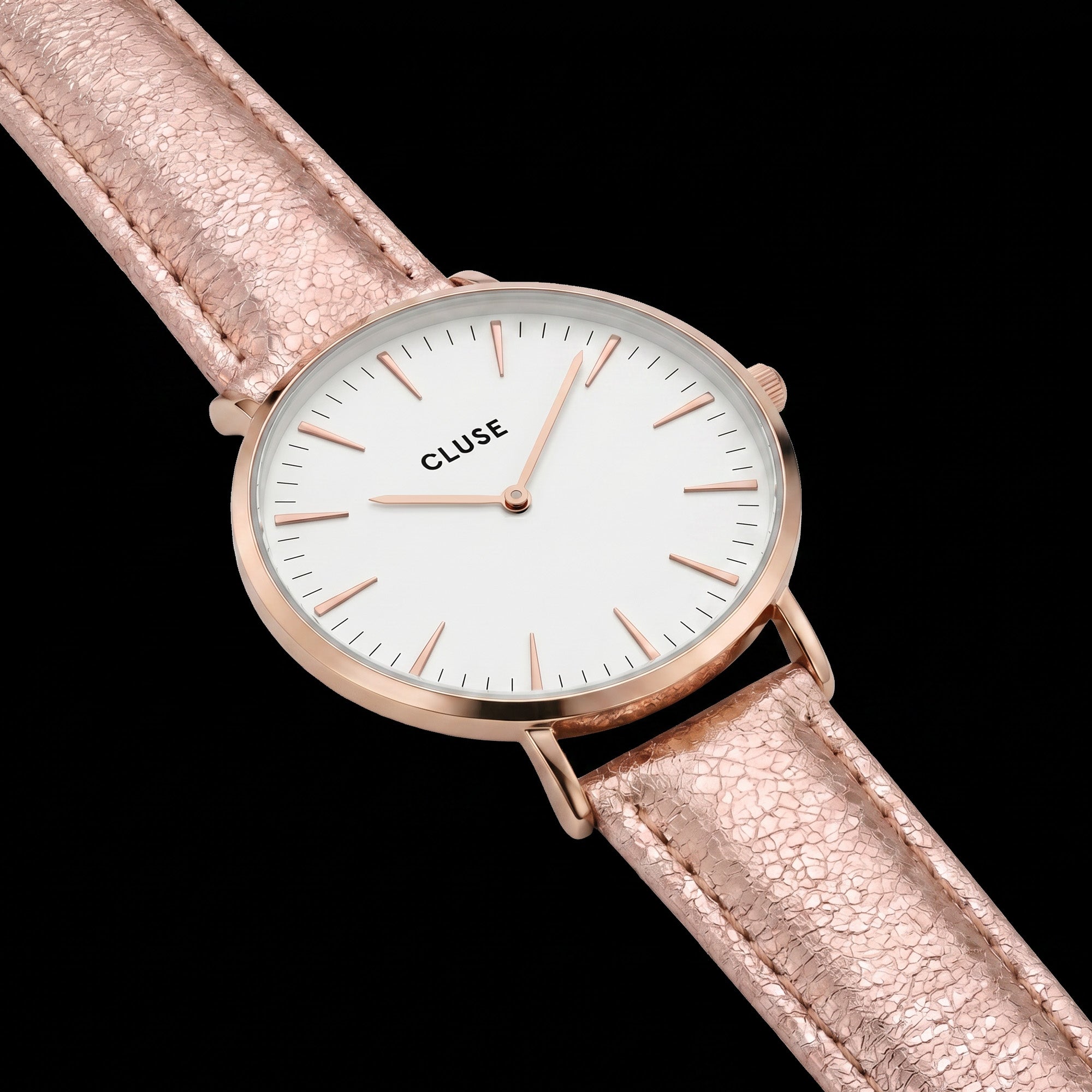Close-up of Cluse La Boheme rose gold white/rose gold metallic watch.