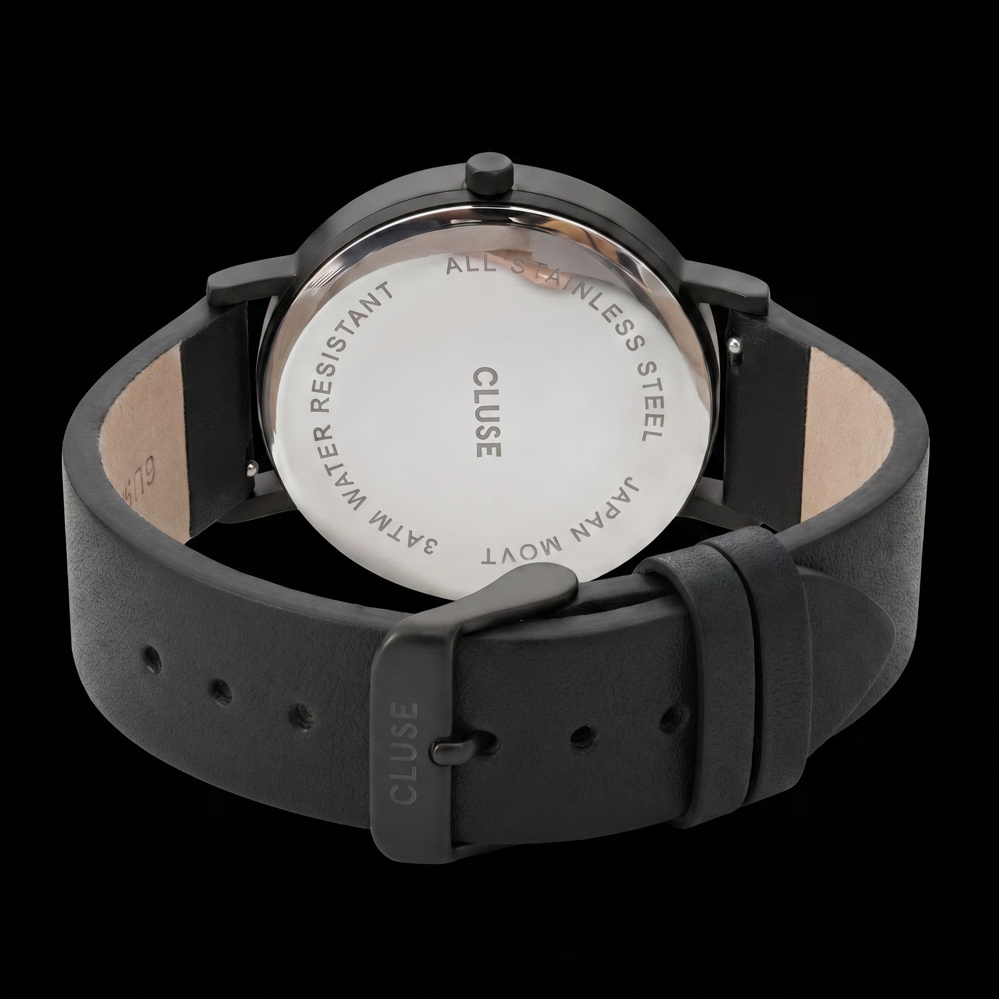 Back view of Cluse La Roche white marble/black watch.