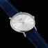 Close-up of Cluse Minuit silver blue velvet limited edition watch.