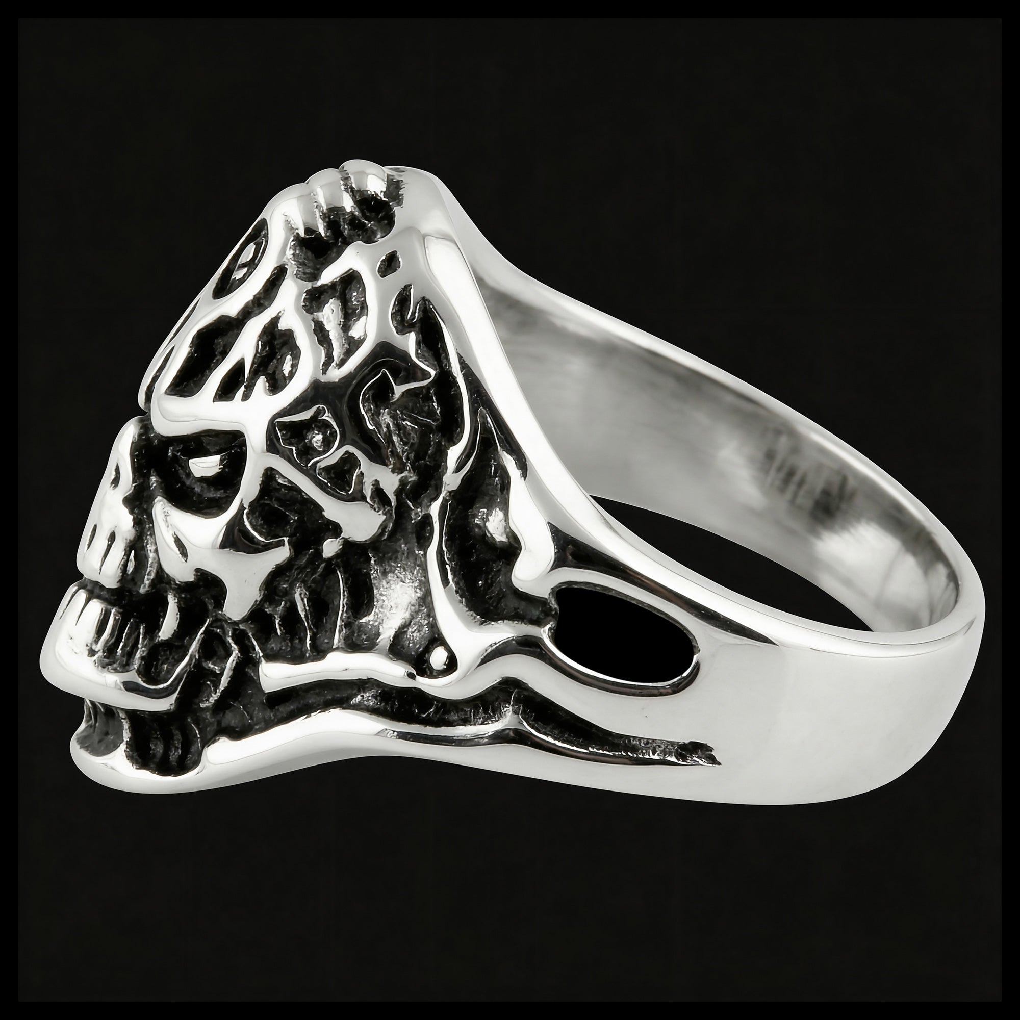 Side view of exoskeleton skull men's stainless steel ring.