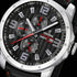 Festina men's red black dial multifunction leather watch dial close-up.