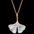 Close up of an Engelsrufer ginkgo leaf rose gold silver necklace.