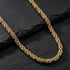 Save Brave Byzantine Chain Gold Steel Necklace On Black Slate Surface