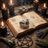 Grey eyeball dragon claw stainless steel men's ring on an occult book open on a table and surrounded by candles, herbs and a pentagram.