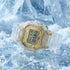 G-Shock DW5735E-7D Glacier Gold round limited edition watch laying on cracked ice.