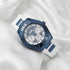Guess Luna sky blue ladies sport watch on white fabric.