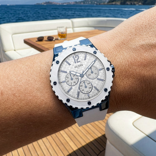 Woman wearing Guess Overdrive sky blue ladies sport watch.