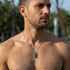 Man wearing stainless steel horned dragon head necklace.