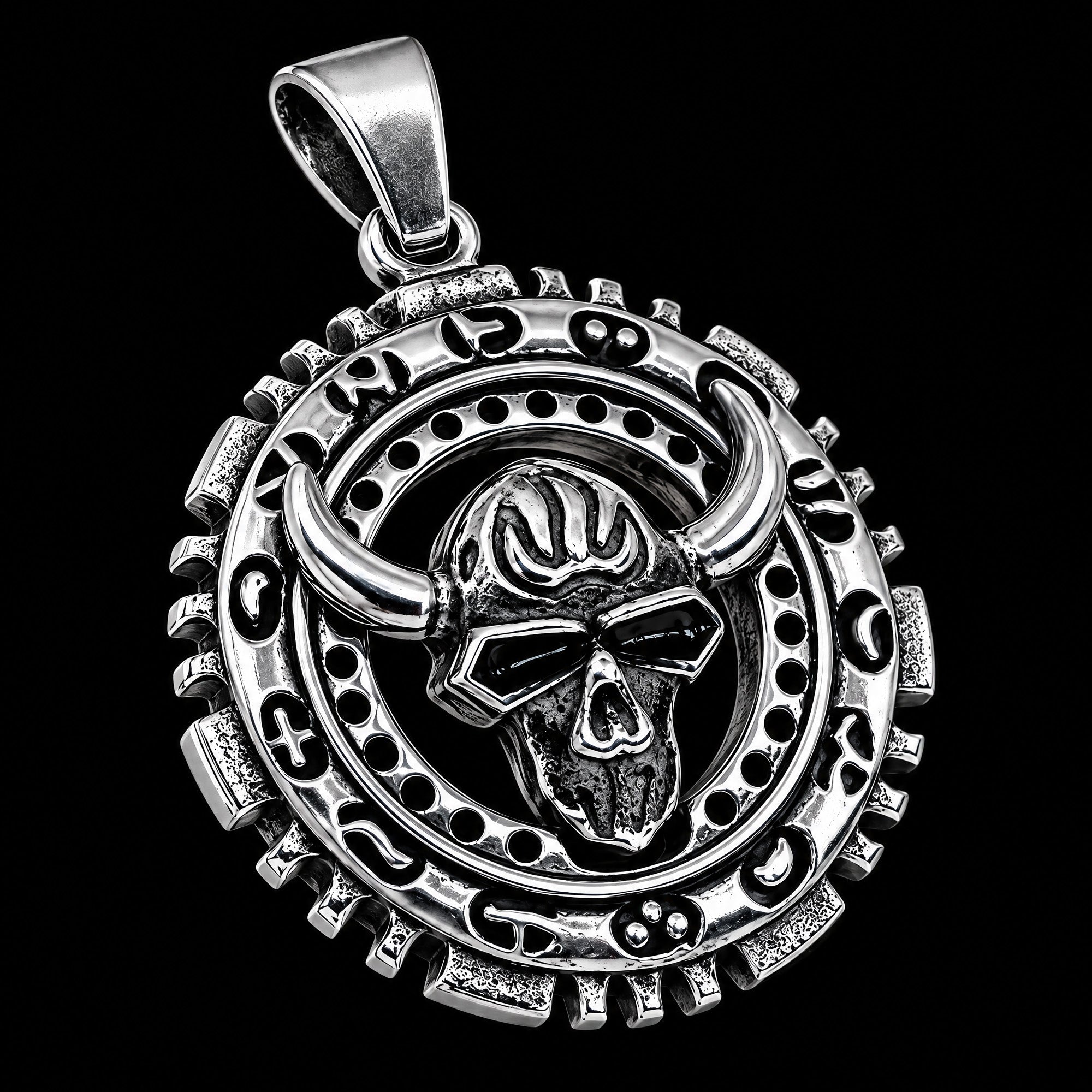 Tilted angle view of Side view of a horned skull stainless steel medallion necklace.