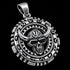 Tilted angle view of Side view of a horned skull stainless steel medallion necklace.