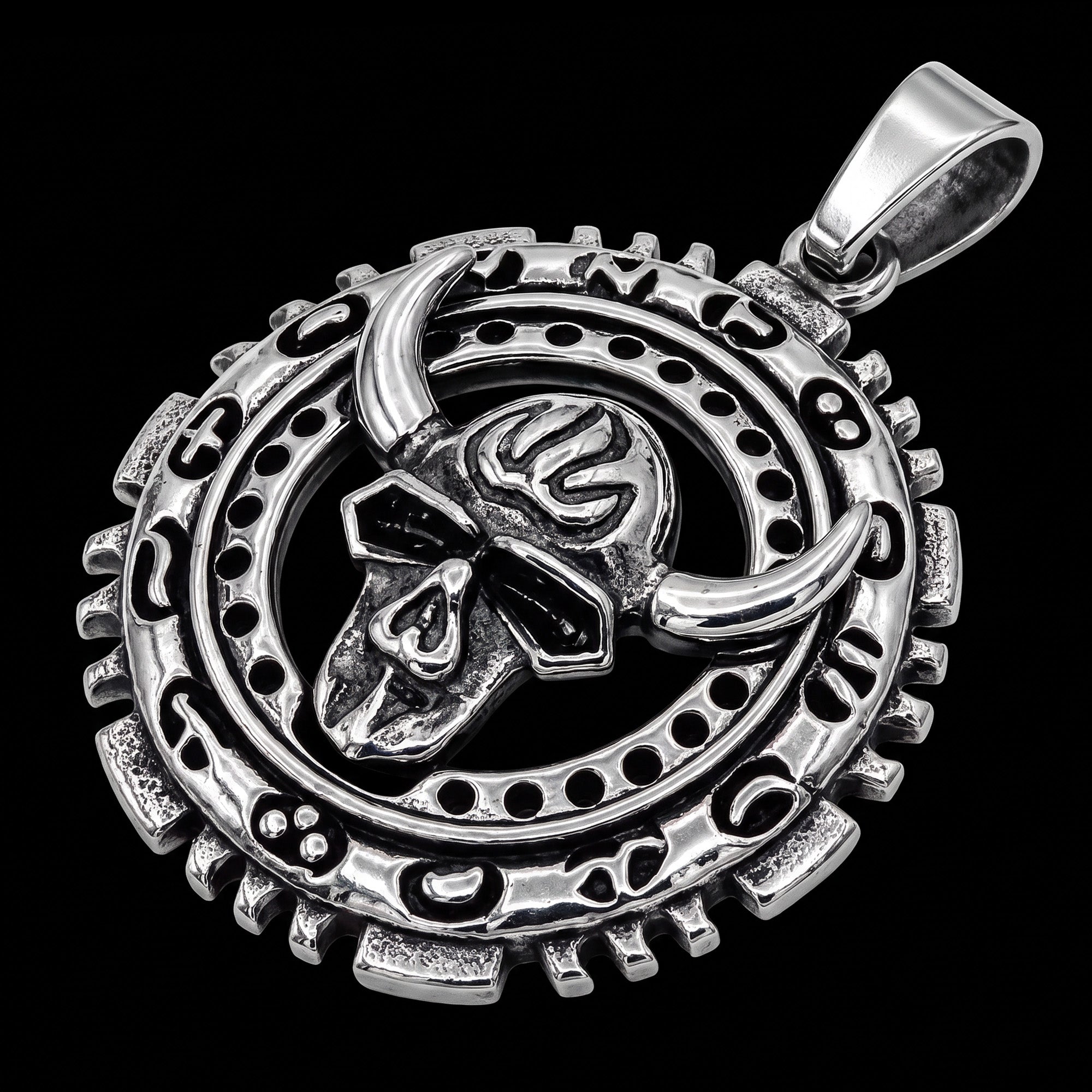 Side view of a horned skull stainless steel medallion necklace.
