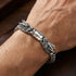 Man wearing hydra dragon sterling silver bracelet