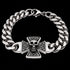 An Iron Cross skull Cuban link stainless steel bracelet showing secure clasp closure.