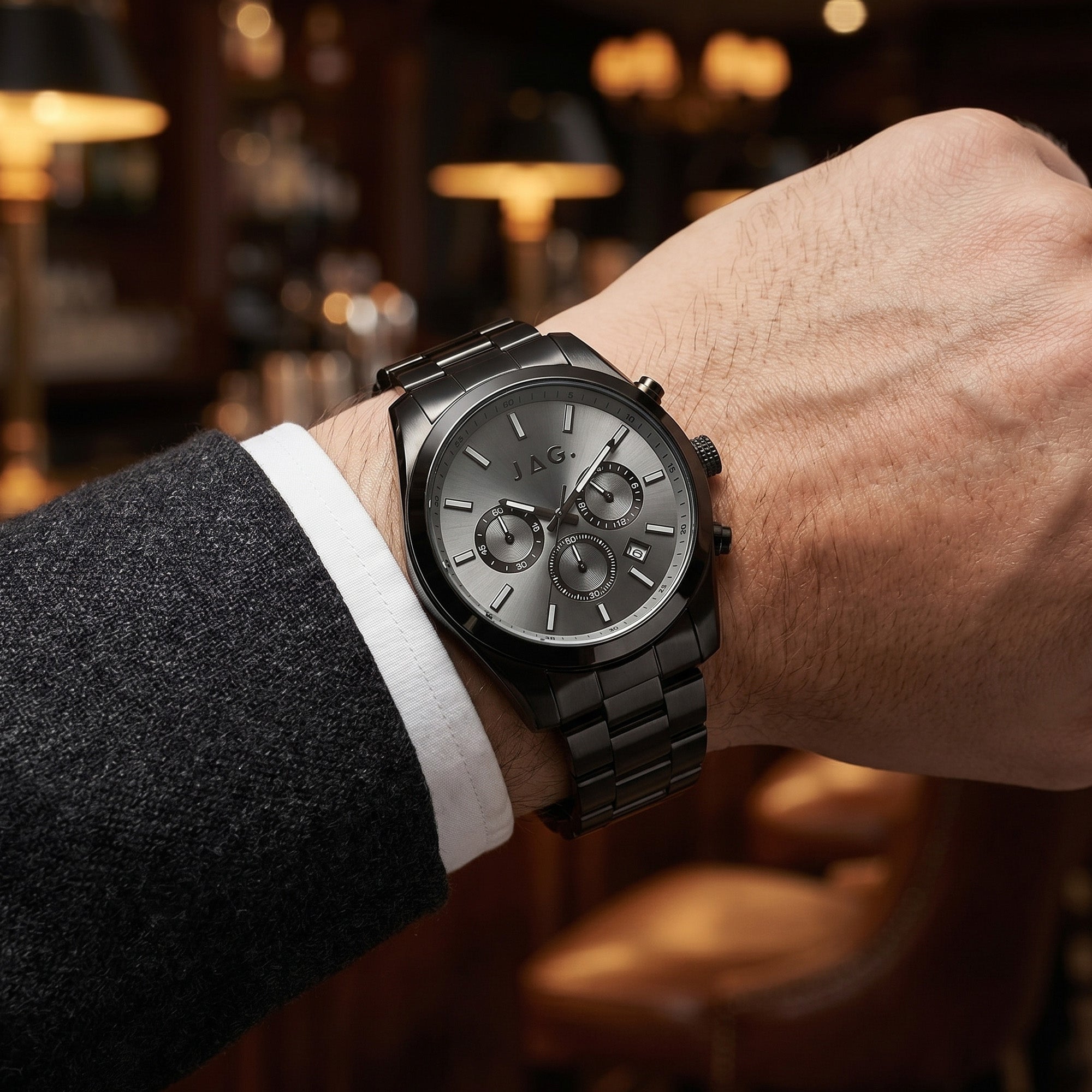 Man wearing JAG Acton men's all black watch on his wrist.