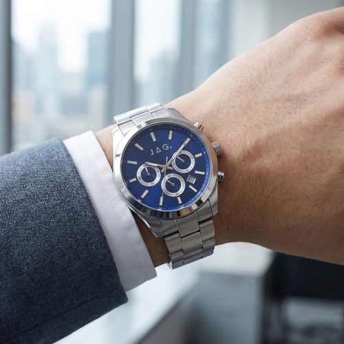 Man wearing JAG Acton men's blue dial silver watch on his wrist.