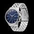 Side tilt view of JAG Albany men's blue dial silver watch.