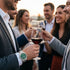 Man at a social gathering wearing a JAG Beaufort green dial silver men's watch.