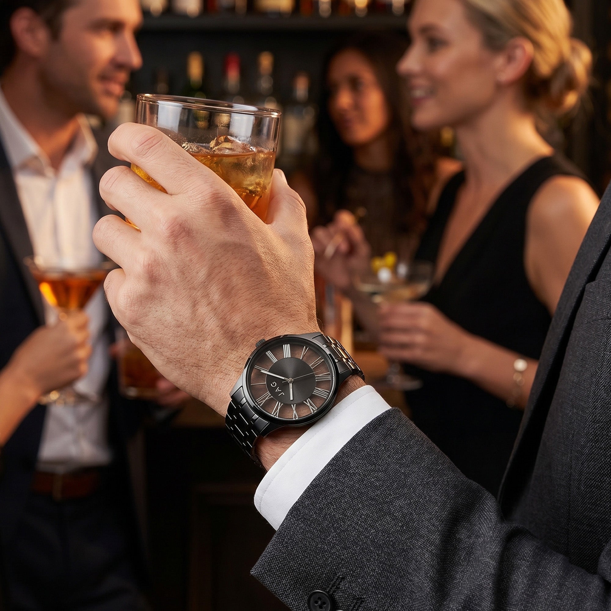 Man wearing a JAG Gerroa black transparent watch at a social gathering.