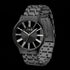 Side tilt view of a JAG Gerroa black transparent men's watch.