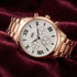 JAG ladies Estelle rose gold watch laying on red velvet fabric.