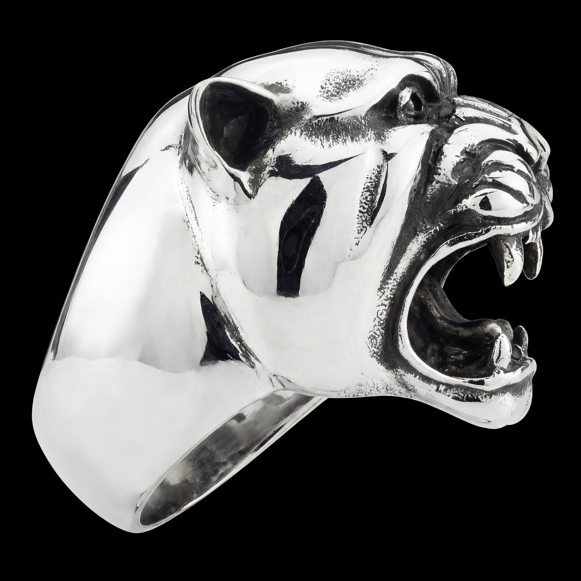 Side profile view of snarling jaguar head stainless steel men's ring.