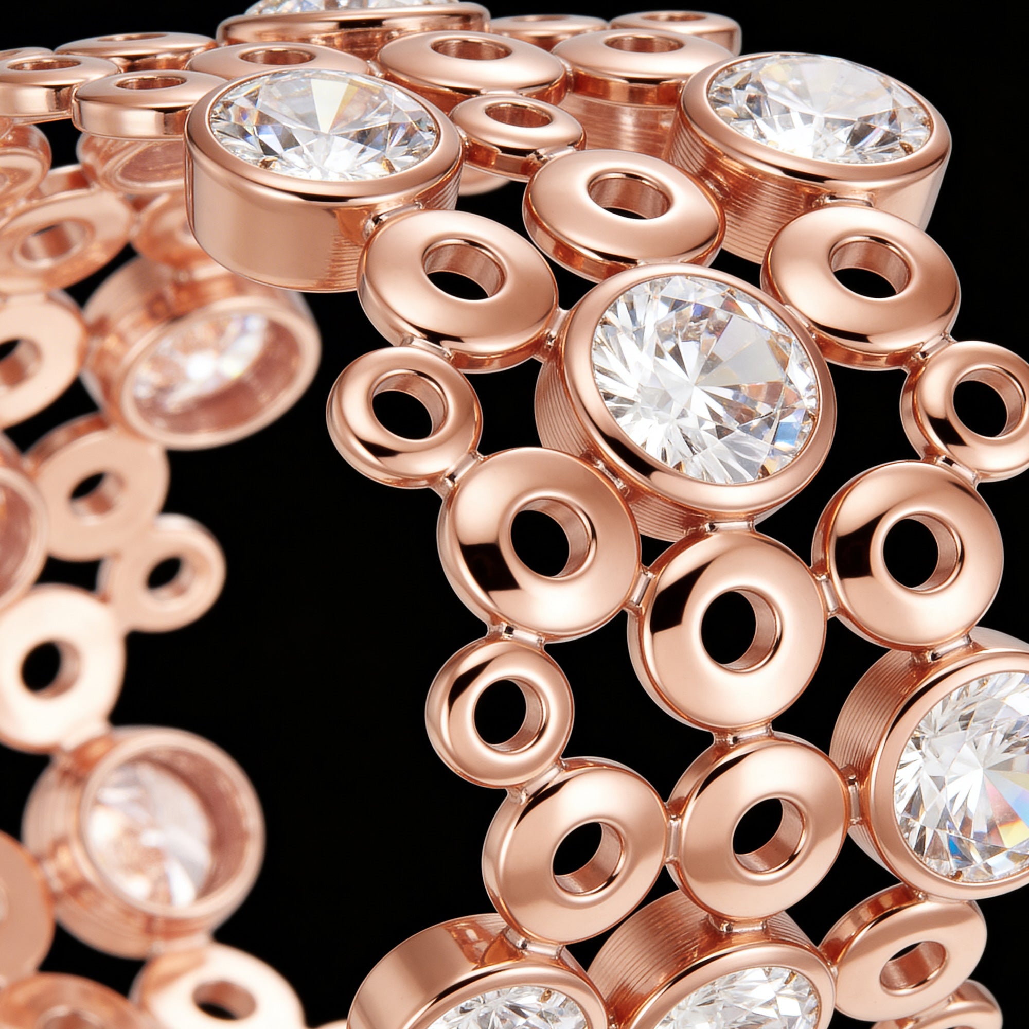 Close-up of Kagi champagne bubbles rose gold cuff bracelet.