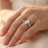 Woman wearing Irish Claddagh solitaire stainless steel ring.