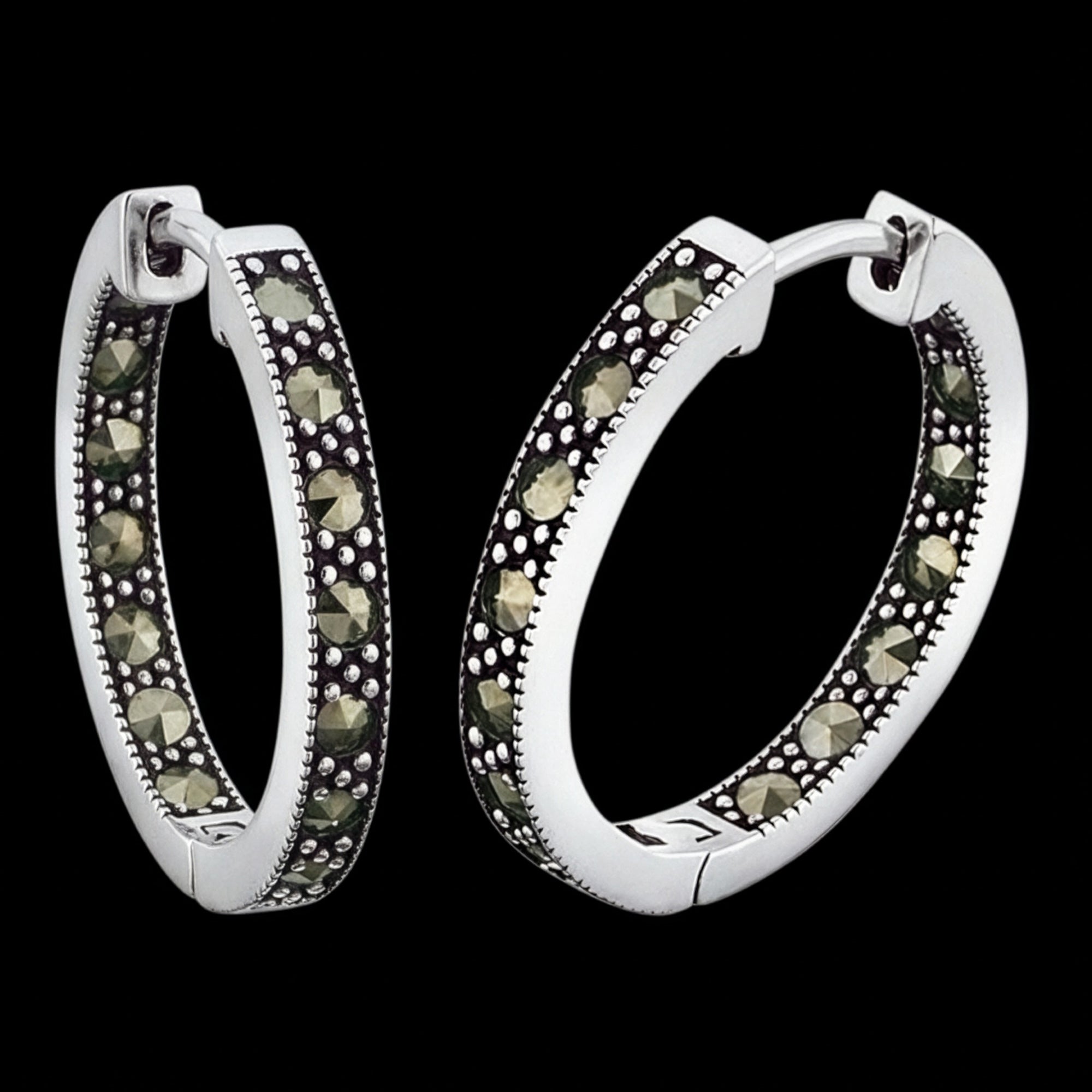Side angle of sterling silver marcasite creole 21.5mm hoop earrings.