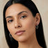 Woman wearing sterling silver marcasite creole 21.5mm hoop earrings.