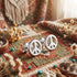 Peace symbol stainless steel stud earrings in a BOHO fabric and bead setting.