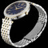 Full side view of Police ladies Dazzle royal blue dial two tone watch.